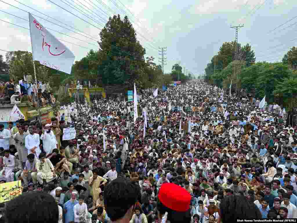Thousands of demonstrators in Pakistan's Bajaur tribal district gather on July 7, calling for an end to violence in the restive area near the Afghan border where the Pakistani Taliban had been active. Shah Nawaz Tarakzai/RFE/RL's Radio Mashaal