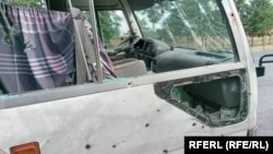 At least four people were killed and 11 others wounded when a roadside bomb struck a minibus that was carrying students and university lecturers in the northern province of Parwan on May 29. 