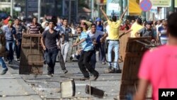 "Мусулман агайындар" кыймылынын жана бийликтен кетирилген президент Мурсинин колдоочулары бүгүн Александрияда армияны колдогондор менен кагылыша кетишти, 26-июль, 2013