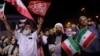 Pro-government demonstrators in Tehran celebrate Iran’s June 13 air strike on Israel. While such scenes are genuine, RFE/RL has found that Iranian state media has also circulated unrelated or outdated visuals to support its narrative of the conflict.