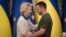 Ukrainian President Volodymyr Zelenskiy (right) and European Commission President Ursula von der Leyen greet each other in Kyiv on September 20.