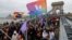 Protesters demonstrate on the Chain Bridge in Budapest after the Hungarian parliament voted on constitutional amendments targeting the LGBT community on April 14.