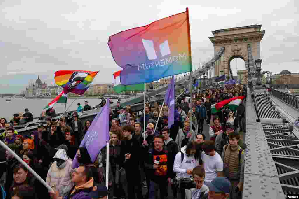 Protesters demonstrate on the Chain Bridge in Budapest after the Hungarian parliament voted on constitutional amendments targeting the LGBT community.