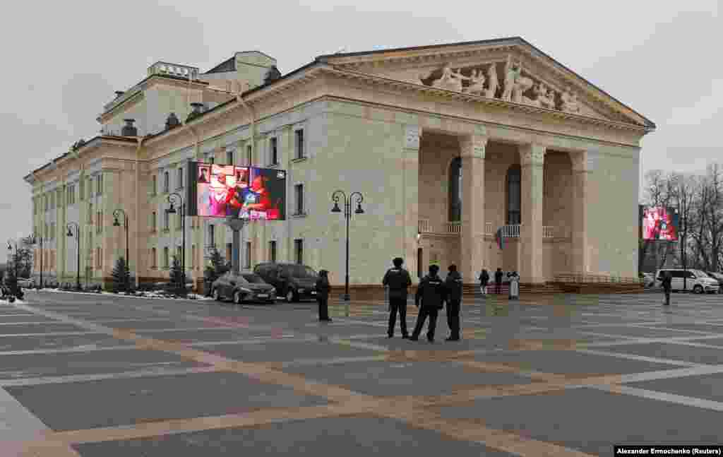 Police at the entrance to the Donetsk Academic Regional Drama Theater.The theater held a ceremony on December 28 to reopen, though theatrical performances will be held in a separate facility nearby.Russian authorities have controlled the southeastern Ukrainian city since capturing it in May 2022 after a brutal siege.