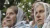 Ukraine - orthodox believers gather to see Russian Patriarch Kirill during his controversial visit to Ukraine. 29Jul2009