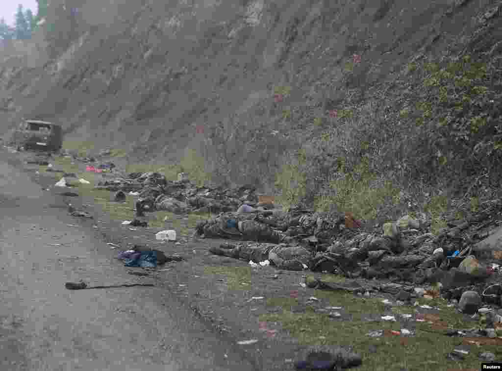 Piles of bodies on the roadside near the town of Shushi/Susa, which was captured by Azerbaijani forces on November 8. RFE/RL was not able to confirm the nationality of the dead fighters in the photographs taken from the convoy.&nbsp;