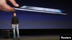 The late Apple CEO Steve Jobs introduces the iPad 2 in San Francisco in March 2011.