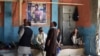 Afghan wrestlers gather at the site of a suicide attack on Septemeber 6 after the blast that targeted wrestlers during a training session at the Maiwand Club, in Kabul a day earlier.