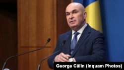 Premierul Ilie Bolojan în conferința de presă din 4 februarie 2026.