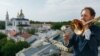 Belarus - Trumpet player brass musician Yauhen Plavinski on the tower of the Viciebsk City Hall, 4Jun2019