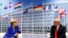 Перамовы Ангелы Мэркель і Дональда Трампа падчас саміту NATO, 11 ліпеня 2011