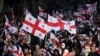 Georgian opposition supporters rally on the day of local elections in central Tbilisi on October 4, 2025. (Photo by GIORGI ARJEVANIDZE / AFP)