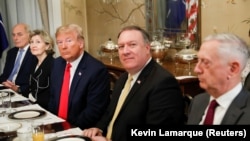 U.S. President Donald Trump, U.S. Secretary of Defence James Mattis, U.S. Secretary of State Mike Pompeo attend a bilateral breakfast with NATO Secretary General Jens Stoltenberg ahead of the NATO Summit in Brussels, Belgium July 11, 2018