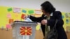 A woman votes during the presidential election in Skopje, North Macedonia, on April 24.