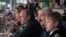Russian President Vladimir Putin (left) and Belarusian leader Alyaksandr Lukashenka (center) with his son Mikalay watch the gold-medal game of Russia vs Finland at the IIHF International Ice Hockey World Championship in Minsk in May 2014.
