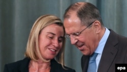 EU foreign policy chief-designate Federica Mogherini with Russian Foreign Minister Sergei Lavrov after a meeting in Moscow in July