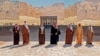A handout picture provided by the Saudi Royal Palace on January 5, 2021, shows from L to R: Kuwaiti Emir Sheikh Nawaf al-Ahmad Al-Sabah, Emir of Qatar Tamim bin Hamad Al-Thani, Omani Deputy Prime Minister Fahd Bin Mahmud, Saudi Crown Prince Mohammed bin S