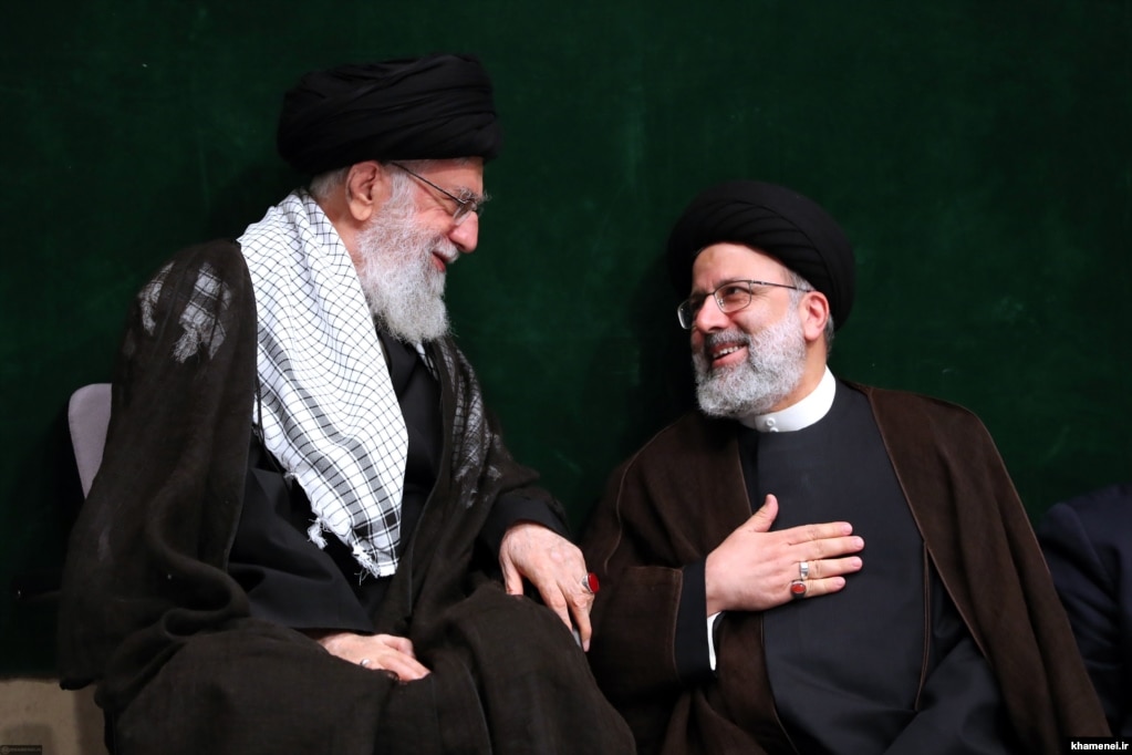 Raisi (right) was widely believed to be the main contender to succeed Supreme Leader Ayatollah Ali Khamenei (left).