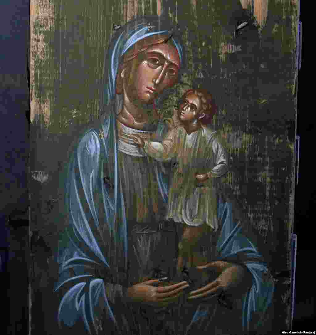 Klymenko says the icon appeared to be &ldquo;at least 800 years old&rdquo; when painted on war-scuffed wood.