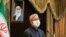 Iran--Iranian government spokesman Ali Rabiei speaks during a news conference in the capital Tehran 