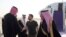 Ukrainian President Volodymyr Zelenskiy is welcomed upon arriving at an airport in an unknown location in Saudi Arabia on February 27.