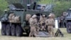 U.S. soldiers take a break during NATO's Saber Strike exercises in Poland in 2017.