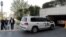 UN vehicles carrying the fact-finding team of the Organization for the Prohibition of Chemical Weapons arrive at the Four Seasons hotel in Damascus on April 14.