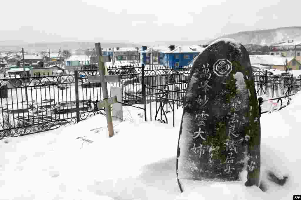 A Japanese gravestone on Kunashir Island. Once captured in 1945, there was a period of uneasy cohabitation (which is the subject of a 2014 animated film) before Josef Stalin ordered the forceful eviction of the Japanese population to mainland Japan in 1947.