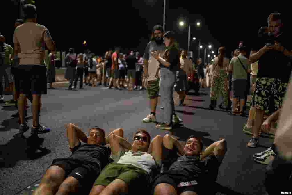 Protesters block a road in Belgrade on June 29.