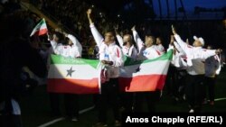 The Somaliland soccer team receive a roaring welcome from the crowd at the Conifa World Football Cup opening ceremony in Abkhazia.