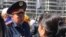 Kazakhstan, Nur-Sultan. Bakhytzhan Malibayev the First Deputy of the City Police department speaking to protesting women. 20 Sept 2019.