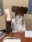 An ultra-Orthodox Jewish child sits in a Yeshiva as he celebrates the carnival-like Purim holiday in Bnei-Brak on March 2, 2026.