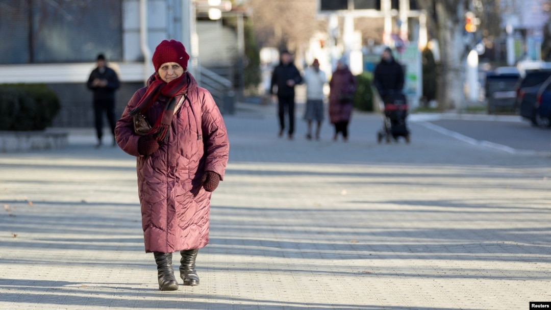 Residents bundle up in Tiraspol, the capital of Moldova's breakaway region of Transdniester, on January 4.