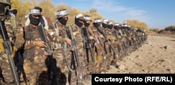 Armed Taliban soldiers attend a training session in Urozgan Province on December 3.