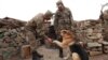 Armenia - Soldiers and a guard dog at an Armenian army post on the border with Azerbaijan, October 15, 2021.