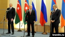 Russia - Russian President Vladimir Putin, Azerbaijani President Ilham Aliyev and Armenian Prime Minister Nikol Pashinian make statements to the press after talks in Sochi, November 26, 2021.
