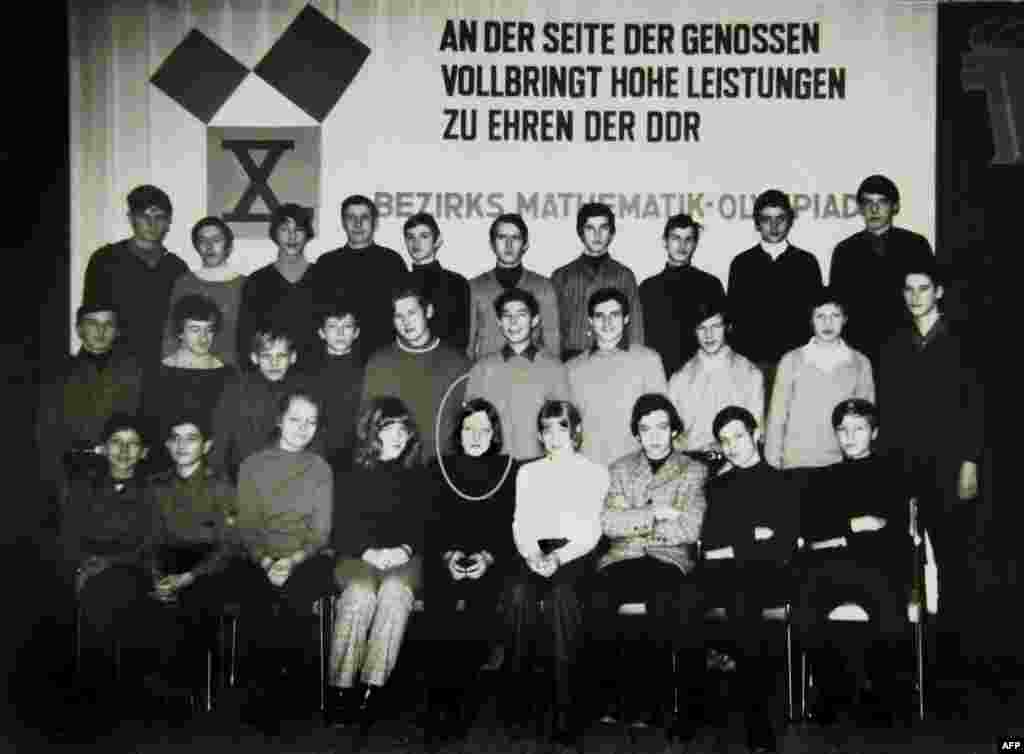 Angela Merkel-Kasner (first row, circled) poses for a group photo at the 1971 Mathematics Olympiad in the Neubrandenburg district in the northeastern town of Teterow, East Germany.