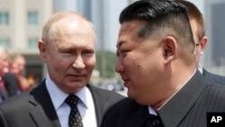 Лідери Росії і КНДР Володимир Путін і Кім Чен Ин у Пхеньяні, 19 червня 2024 року