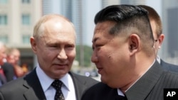 Уладзімір Пуцін і Кім Чэн Ын, 19 чэрвеня 2024. Здымак Sputnik, Kremlin Pool Photo via AP