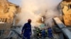 მაშველები მუშაობენ რუსული დარტყმის ადგილზე კიევში. 2025 წლის 28 აგვისტო