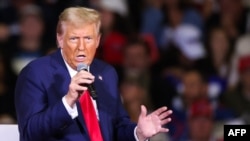 Former US President and Republican presidential candidate Donald Trump speaks during a town hall at the Convention Center in Lancaster, Pennsylvania, October 20, 2024. 