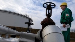 A Hungarian engineer works at the receiving area of the Druzhba oil pipeline at an oil refinery south of Budapest. (file photo)