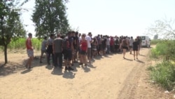 Migrants Camp In Serbian Fields, Avoiding Official Camps