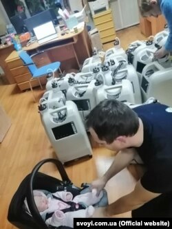 Oxygen condensators stand in the main office of Svoyi, a nonprofit group that supplies oxygen to at-home COVID-19 patients free of charge in Kyiv and the surrounding area.