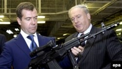 Russian President Dmitry Medvedev holds a Kalashnikov during a visit to a factory in Izhevsk.