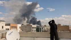 Smoke rises following an explosion in Tehran on March 1. 
