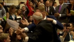 Man Bundled Away From Trump-Putin Briefing