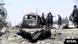 The site of a car-bomb attack claimed by the Taliban in Kabul