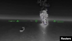 Скриншот с видео СБС Украины, на котором запечатлен удар по российскому такеру в Азовском море