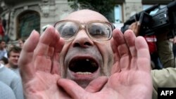 A protester shouts slogans during a demonstration in central Moscow on July 18.